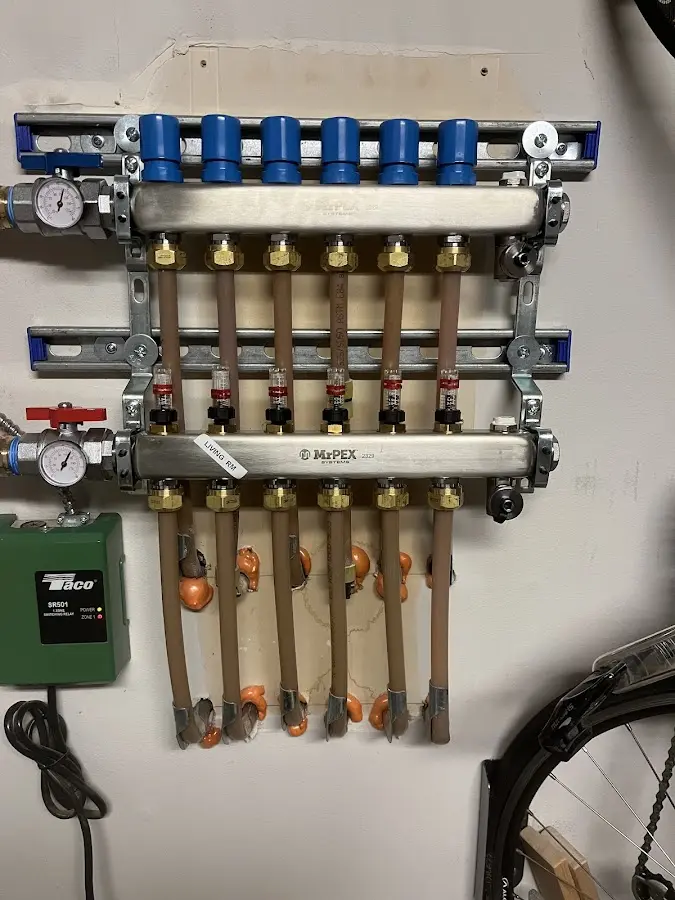 Plumber performing Water Heater Repair at a residential property in Lakemoor